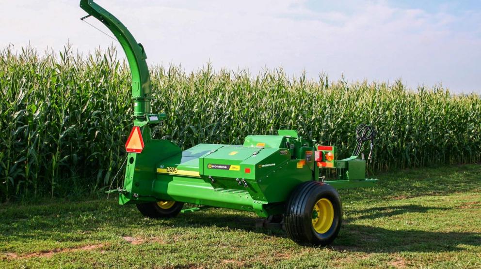 Horning kernel processor kit on green pull-behind harvester